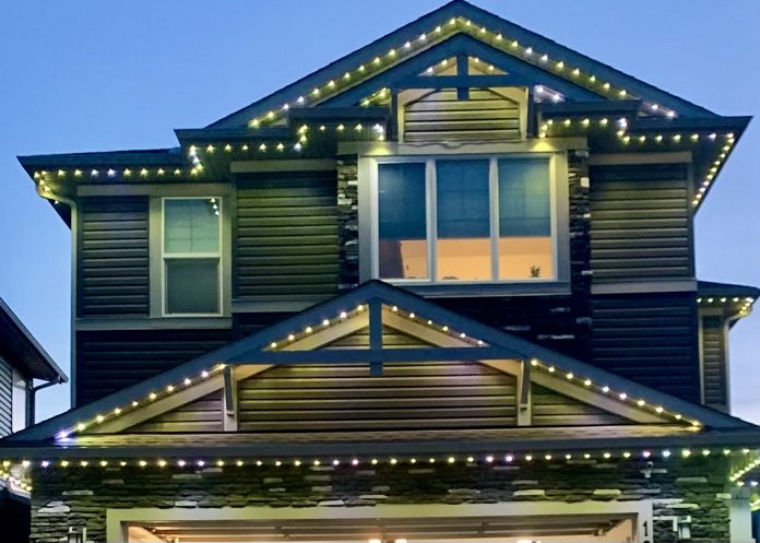Permanent LED roofline at dusk